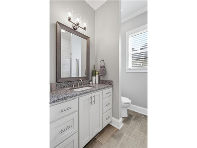 Enjoy resort-style living in National Village at the Robert on Grand National Golf Course in Alabama - for sale on GolfHomes.com, golf home, golf lot