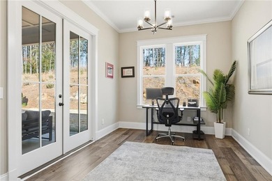 Enjoy resort-style living in National Village at the Robert on Grand National Golf Course in Alabama - for sale on GolfHomes.com, golf home, golf lot