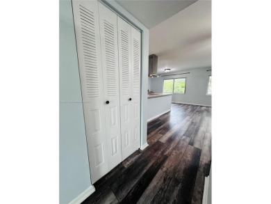 Bright and spacious corner unit in the desirable Century Village on Flamingo Lakes Country Club in Florida - for sale on GolfHomes.com, golf home, golf lot