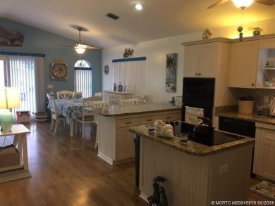 BEAUTIFUL, SPACIOUS CUSTOM SITE-BUILT (*STICK-BUILT*) 2 BEDROOM on Island Dunes Country Club in Florida - for sale on GolfHomes.com, golf home, golf lot