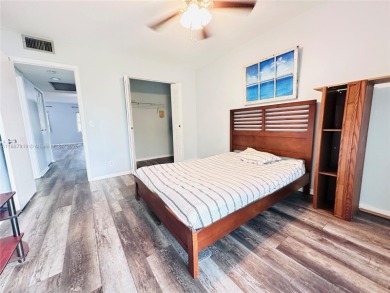 Bright and spacious corner unit in the desirable Century Village on Flamingo Lakes Country Club in Florida - for sale on GolfHomes.com, golf home, golf lot