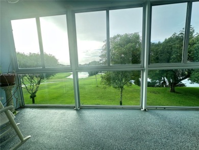 Bright and spacious corner unit in the desirable Century Village on Flamingo Lakes Country Club in Florida - for sale on GolfHomes.com, golf home, golf lot