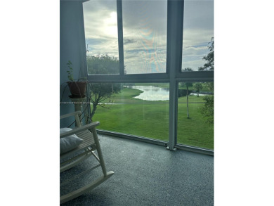 Bright and spacious corner unit in the desirable Century Village on Flamingo Lakes Country Club in Florida - for sale on GolfHomes.com, golf home, golf lot