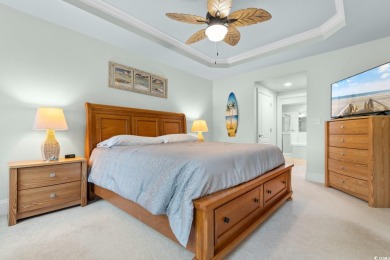 Experience luxury and tranquility in this fully furnished on Barefoot Resort and Golf Club  in South Carolina - for sale on GolfHomes.com, golf home, golf lot