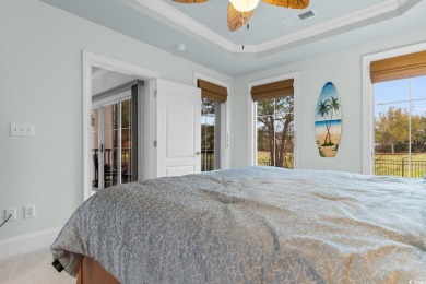 Experience luxury and tranquility in this fully furnished on Barefoot Resort and Golf Club  in South Carolina - for sale on GolfHomes.com, golf home, golf lot