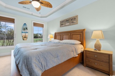 Experience luxury and tranquility in this fully furnished on Barefoot Resort and Golf Club  in South Carolina - for sale on GolfHomes.com, golf home, golf lot