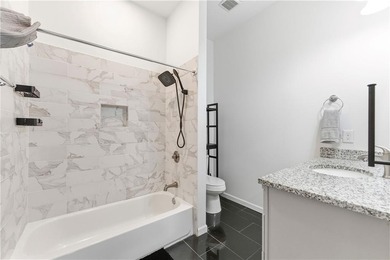 Welcome to 902 Gaston Street, a beautifully renovated Craftsman on John A. White Golf Course in Georgia - for sale on GolfHomes.com, golf home, golf lot