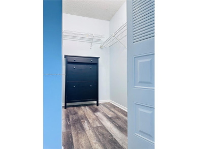 Bright and spacious corner unit in the desirable Century Village on Flamingo Lakes Country Club in Florida - for sale on GolfHomes.com, golf home, golf lot