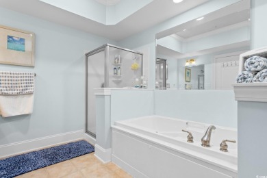 Experience luxury and tranquility in this fully furnished on Barefoot Resort and Golf Club  in South Carolina - for sale on GolfHomes.com, golf home, golf lot