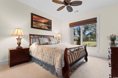 Experience luxury and tranquility in this fully furnished on Barefoot Resort and Golf Club  in South Carolina - for sale on GolfHomes.com, golf home, golf lot