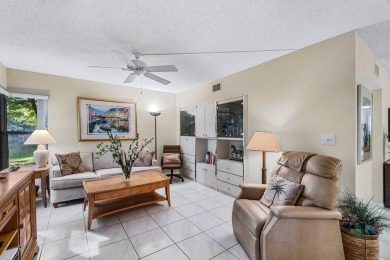 REDUCED*Lake Views from this1st Floor Corner Garden Condo on the on Boca Delray Golf and Country Club in Florida - for sale on GolfHomes.com, golf home, golf lot