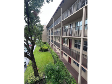 Bright and spacious corner unit in the desirable Century Village on Flamingo Lakes Country Club in Florida - for sale on GolfHomes.com, golf home, golf lot