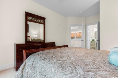 Experience luxury and tranquility in this fully furnished on Barefoot Resort and Golf Club  in South Carolina - for sale on GolfHomes.com, golf home, golf lot