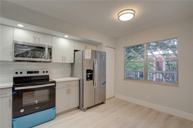 Remodeled 2 bed 2 Bath condo in the Resort Style, 55+ gated on Flamingo Lakes Country Club in Florida - for sale on GolfHomes.com, golf home, golf lot