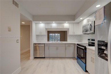 Remodeled 2 bed 2 Bath condo in the Resort Style, 55+ gated on Flamingo Lakes Country Club in Florida - for sale on GolfHomes.com, golf home, golf lot
