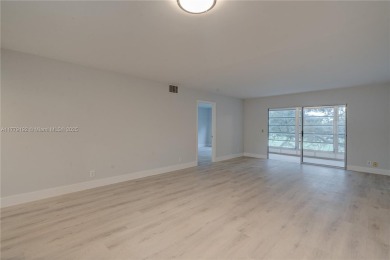 Remodeled 2 bed 2 Bath condo in the Resort Style, 55+ gated on Flamingo Lakes Country Club in Florida - for sale on GolfHomes.com, golf home, golf lot