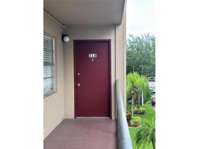 Bright and spacious corner unit in the desirable Century Village on Flamingo Lakes Country Club in Florida - for sale on GolfHomes.com, golf home, golf lot
