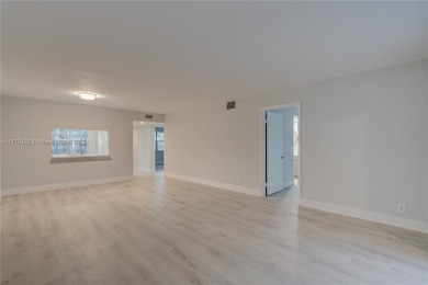 Remodeled 2 bed 2 Bath condo in the Resort Style, 55+ gated on Flamingo Lakes Country Club in Florida - for sale on GolfHomes.com, golf home, golf lot