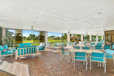 REDUCED*Lake Views from this1st Floor Corner Garden Condo on the on Boca Delray Golf and Country Club in Florida - for sale on GolfHomes.com, golf home, golf lot