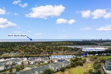 Experience luxury and tranquility in this fully furnished on Barefoot Resort and Golf Club  in South Carolina - for sale on GolfHomes.com, golf home, golf lot