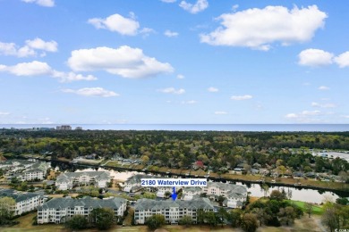 Experience luxury and tranquility in this fully furnished on Barefoot Resort and Golf Club  in South Carolina - for sale on GolfHomes.com, golf home, golf lot