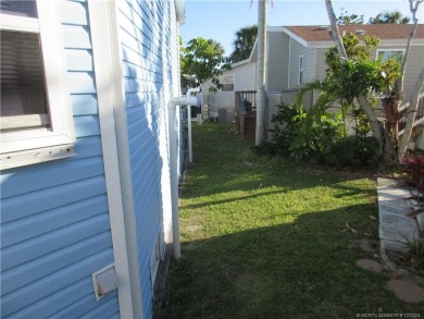 BEAUTIFUL, SPACIOUS CUSTOM SITE-BUILT (*STICK-BUILT*) 2 BEDROOM on Island Dunes Country Club in Florida - for sale on GolfHomes.com, golf home, golf lot