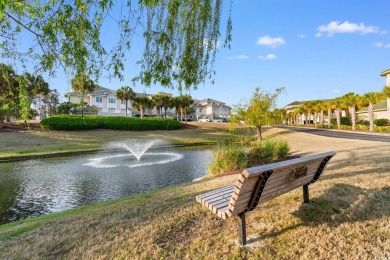 Experience luxury and tranquility in this fully furnished on Barefoot Resort and Golf Club  in South Carolina - for sale on GolfHomes.com, golf home, golf lot