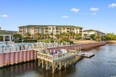Experience luxury and tranquility in this fully furnished on Barefoot Resort and Golf Club  in South Carolina - for sale on GolfHomes.com, golf home, golf lot