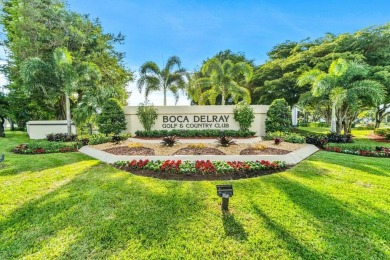 REDUCED*Lake Views from this1st Floor Corner Garden Condo on the on Boca Delray Golf and Country Club in Florida - for sale on GolfHomes.com, golf home, golf lot