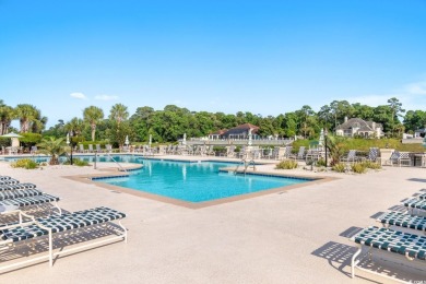 Experience luxury and tranquility in this fully furnished on Barefoot Resort and Golf Club  in South Carolina - for sale on GolfHomes.com, golf home, golf lot