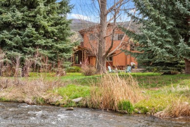 A beautiful corner lot location on a stream in the one-of-a-kind on Ranch at Roaring Fork Golf Course in Colorado - for sale on GolfHomes.com, golf home, golf lot