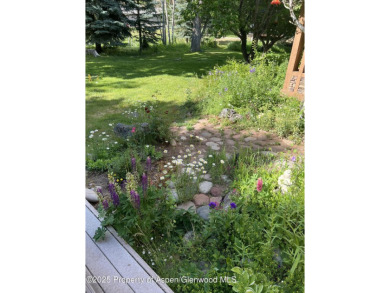 A beautiful corner lot location on a stream in the one-of-a-kind on Ranch at Roaring Fork Golf Course in Colorado - for sale on GolfHomes.com, golf home, golf lot