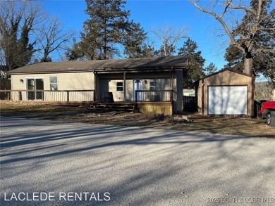 Welcome to this remodeled 2-bedroom, 2-bath home located on the on Lake Valley Country Club in Missouri - for sale on GolfHomes.com, golf home, golf lot