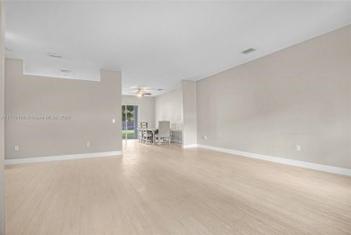 Beautiful 4-bedroom, 3-bath home nestled in the serene, gated on Keys Gate Golf Club in Florida - for sale on GolfHomes.com, golf home, golf lot
