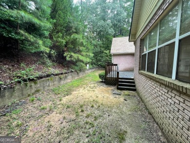 Welcome to 100 Goldfinch Circle-an all-brick ranch-style home on Turtle Cove Golf Course in Georgia - for sale on GolfHomes.com, golf home, golf lot