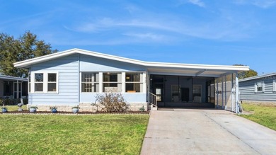 Welcome home to this beautifully maintained manufactured home on Bay Tree Golf Course in Florida - for sale on GolfHomes.com, golf home, golf lot
