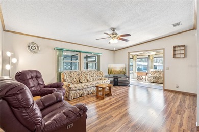 Welcome home to this beautifully maintained manufactured home on Bay Tree Golf Course in Florida - for sale on GolfHomes.com, golf home, golf lot