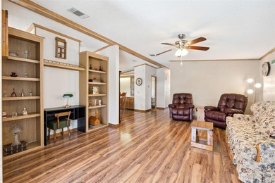 Welcome home to this beautifully maintained manufactured home on Bay Tree Golf Course in Florida - for sale on GolfHomes.com, golf home, golf lot