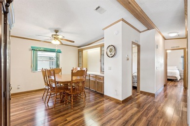 Welcome home to this beautifully maintained manufactured home on Bay Tree Golf Course in Florida - for sale on GolfHomes.com, golf home, golf lot