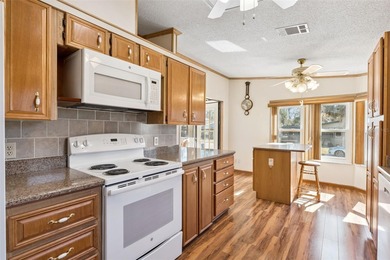 Under contract-accepting backup offers. Welcome home to this on Bay Tree Golf Course in Florida - for sale on GolfHomes.com, golf home, golf lot