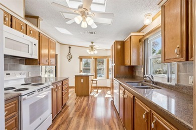 Under contract-accepting backup offers. Welcome home to this on Bay Tree Golf Course in Florida - for sale on GolfHomes.com, golf home, golf lot