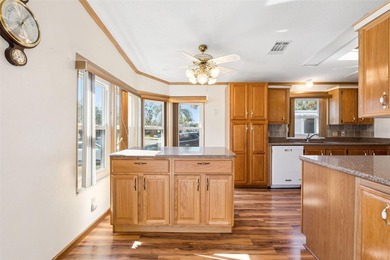 Under contract-accepting backup offers. Welcome home to this on Bay Tree Golf Course in Florida - for sale on GolfHomes.com, golf home, golf lot