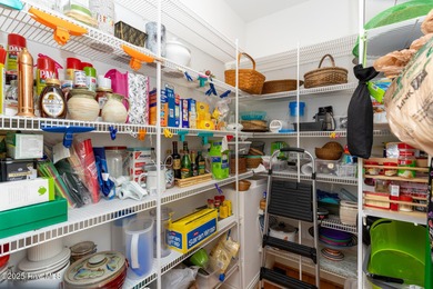 Welcome to this elegant, all-brick custom home built by on Pinewild Country Club of Pinehurst in North Carolina - for sale on GolfHomes.com, golf home, golf lot