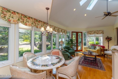 Welcome to this elegant, all-brick custom home built by on Pinewild Country Club of Pinehurst in North Carolina - for sale on GolfHomes.com, golf home, golf lot