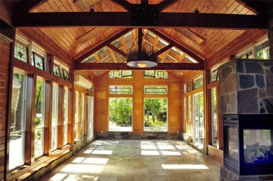 This unique lake home features large windows, offering on Lake Kiowa Golf Course in Texas - for sale on GolfHomes.com, golf home, golf lot