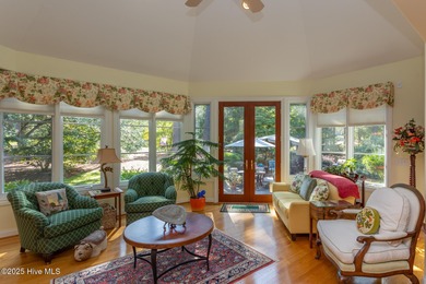 Welcome to this elegant, all-brick custom home built by on Pinewild Country Club of Pinehurst in North Carolina - for sale on GolfHomes.com, golf home, golf lot