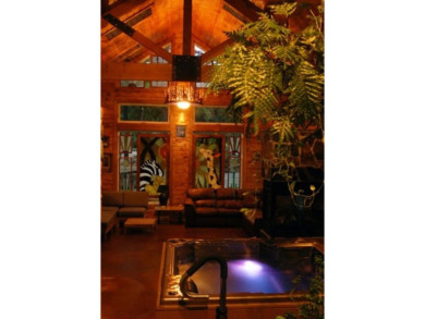 This unique lake home features large windows, offering on Lake Kiowa Golf Course in Texas - for sale on GolfHomes.com, golf home, golf lot