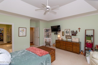 Welcome to this elegant, all-brick custom home built by on Pinewild Country Club of Pinehurst in North Carolina - for sale on GolfHomes.com, golf home, golf lot