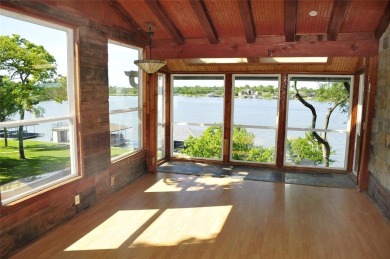 This unique lake home features large windows, offering on Lake Kiowa Golf Course in Texas - for sale on GolfHomes.com, golf home, golf lot