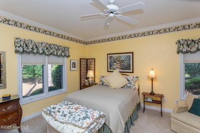 Welcome to this elegant, all-brick custom home built by on Pinewild Country Club of Pinehurst in North Carolina - for sale on GolfHomes.com, golf home, golf lot